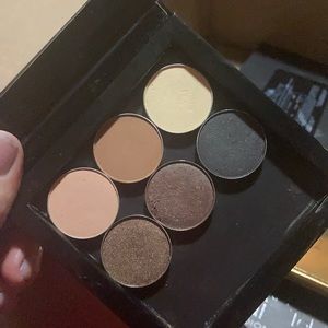 Four Ofra Cosmetic shadows and two makeup G…
